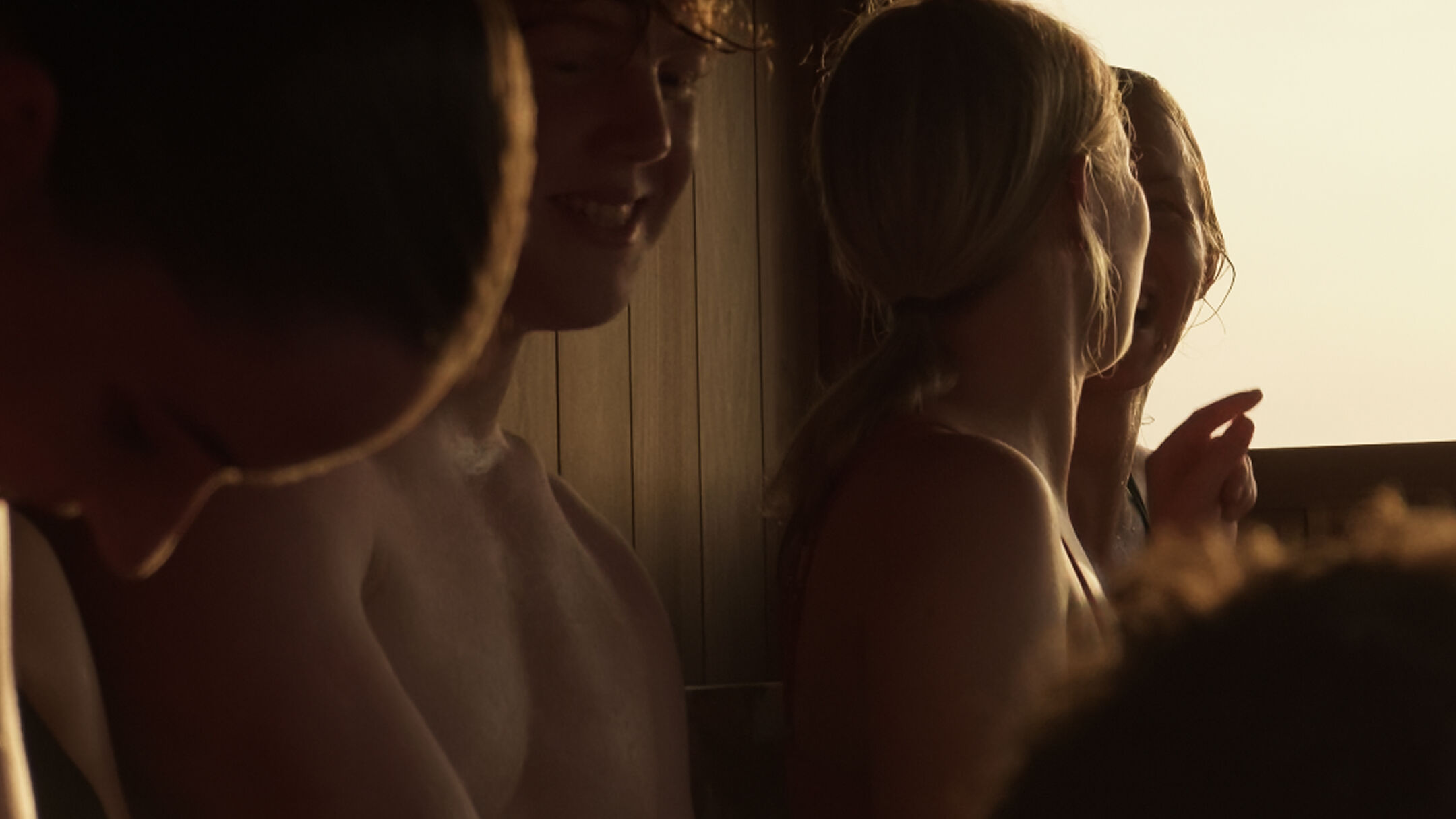 Group of people enjoying the sauna