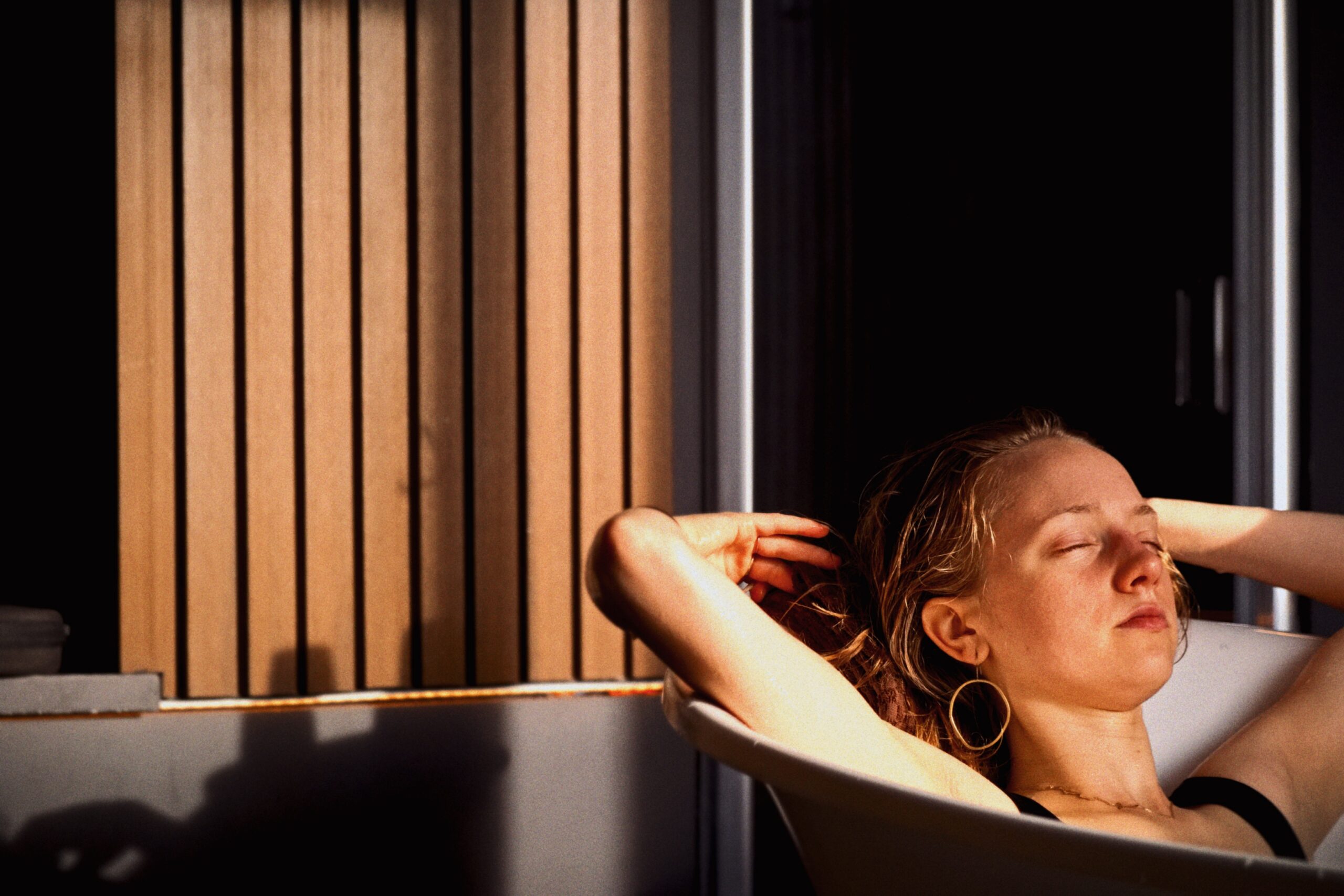 Woman relaxing in a seaweed bath at VOYA Seaweed Baths