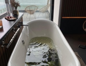 A seaweed bath being prepared