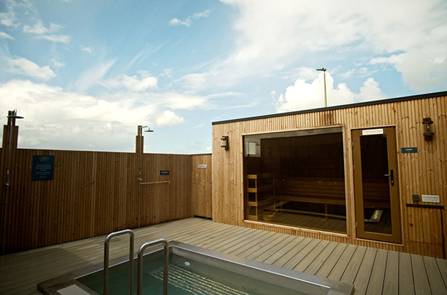Outdoor sauna and plunge pool at VOYA Seaweed Baths in Strandhill