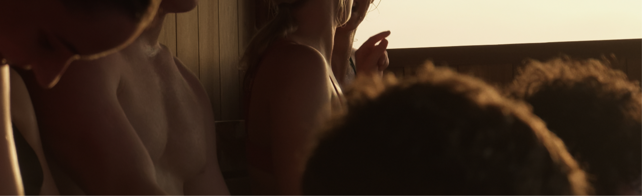 Group of people enjoying the sauna