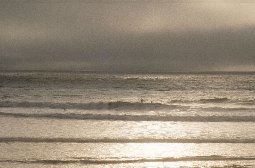 Surfers on the Atlantic Ocean at Strandhill Beach