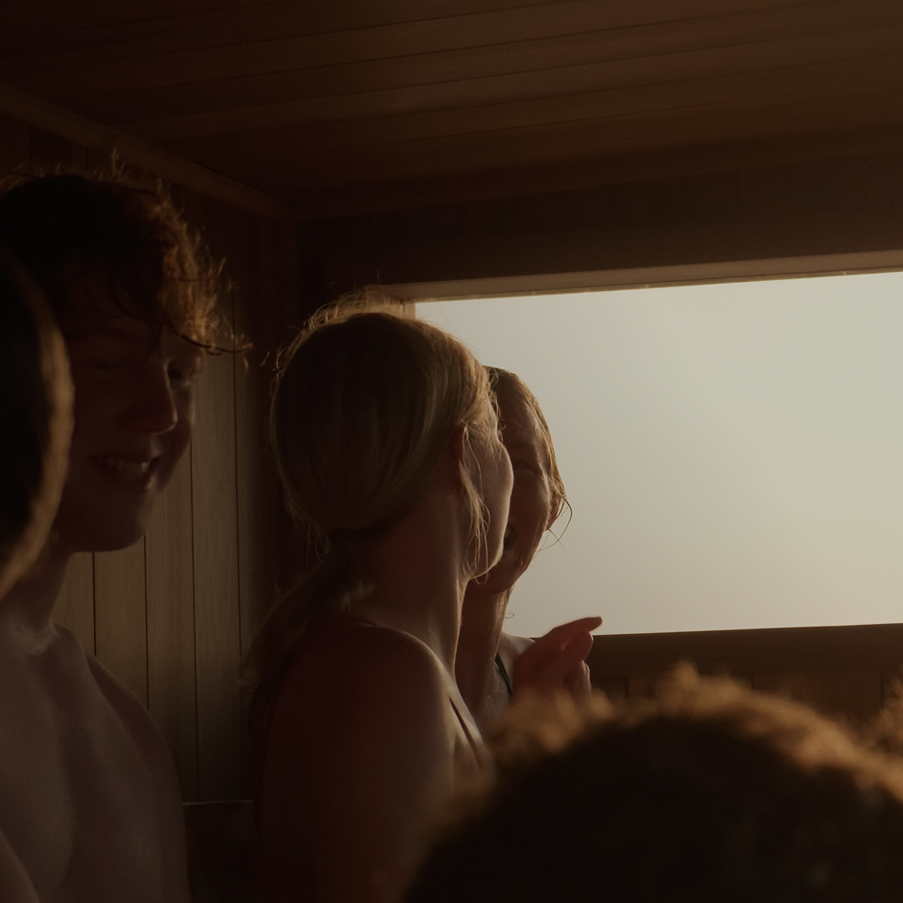 A group of people enjoying the sauna