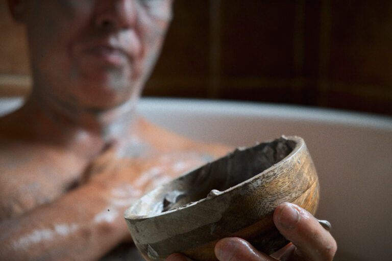 A man applying cream at VOYA seaweed baths and spa