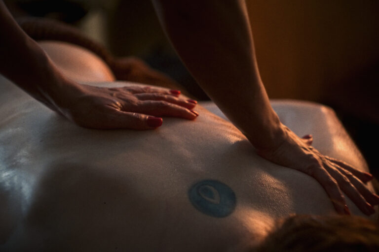 A man receives a massage at VOYA spa